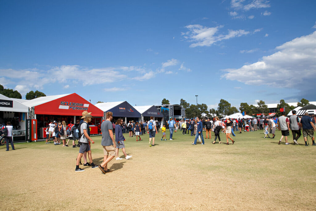 People walking outside on best outdoor trade shows.